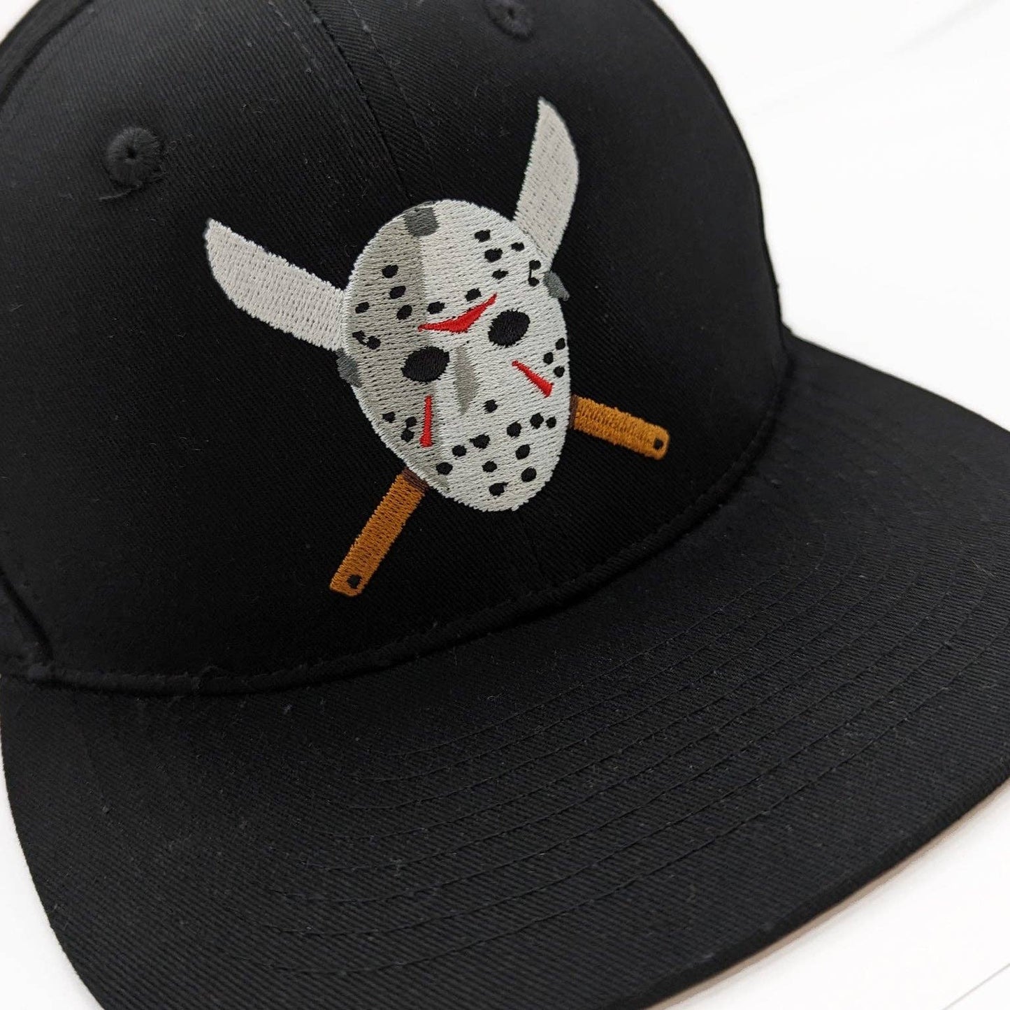 Jason Embroidered Snapback Hat